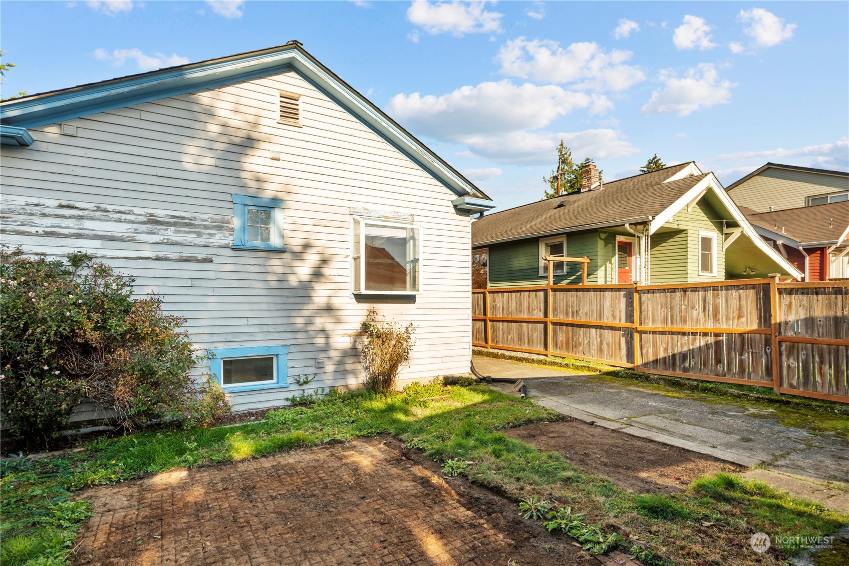 517 North 84th Street Seattle, WA 98103 - Photo 26 of 29 a view of a house with a yard