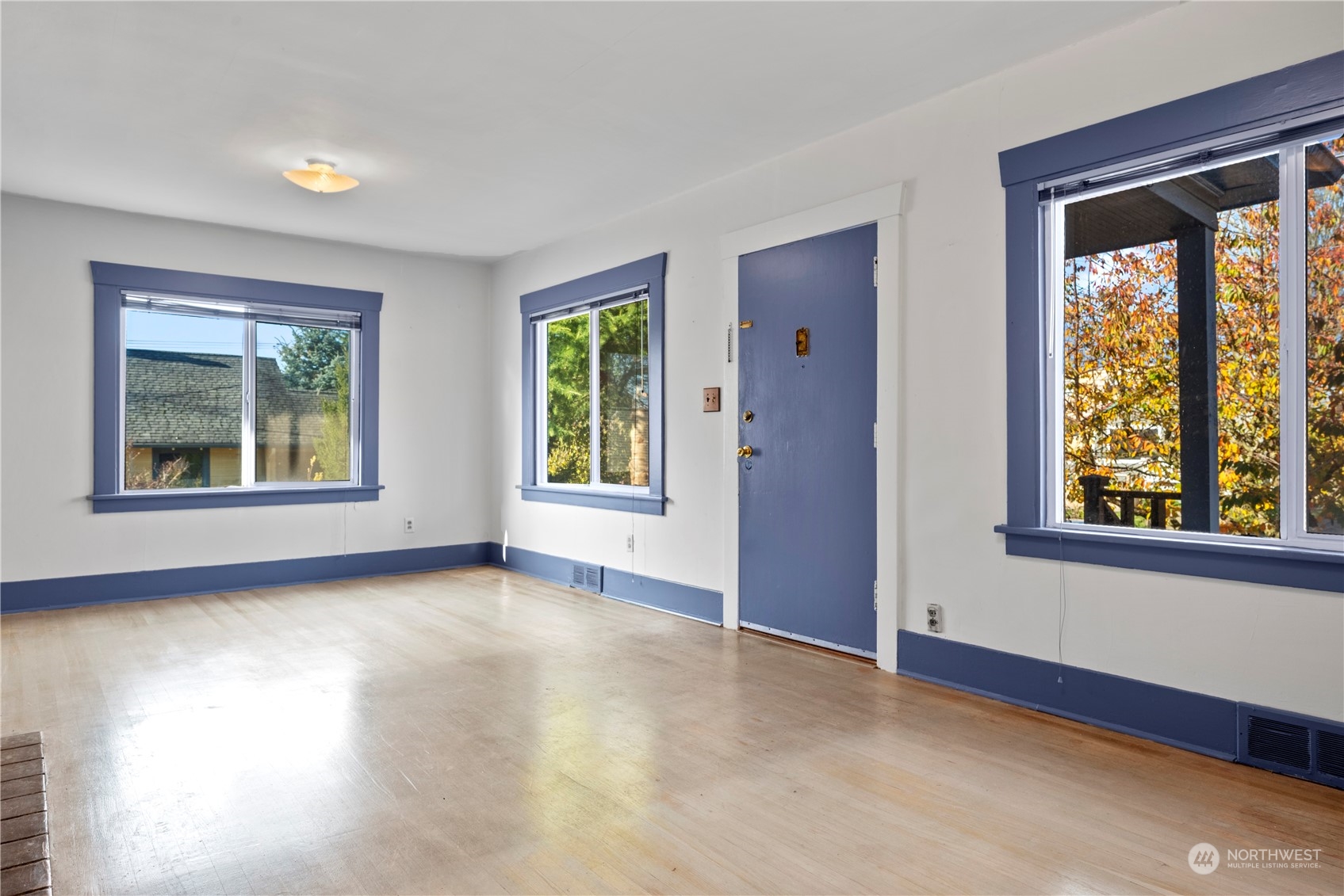 517 North 84th Street Seattle, WA 98103 - Photo 7 of 29 a view of an empty room with a window