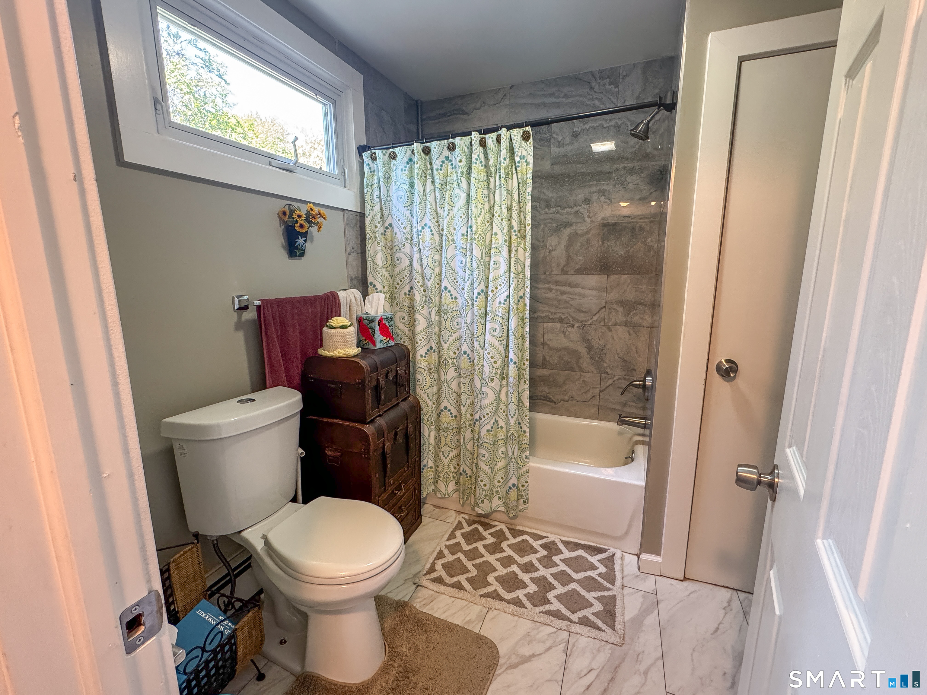 36 Jennings Street Norwich, CT 06360 - Photo 22 of 33 a bathroom with a toilet and a shower