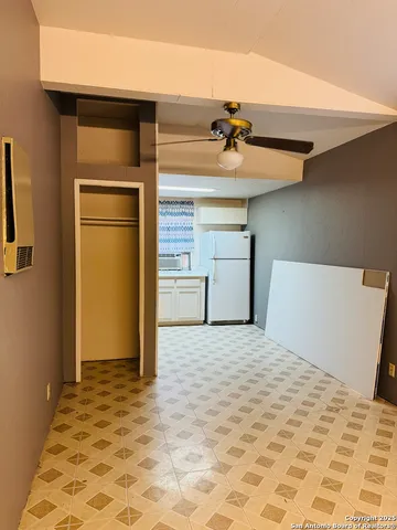 a view of a big room with a chandelier