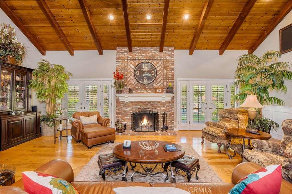 27767 Sand Canyon Road Canyon Country, CA 91387 - Photo 22 of 64 a living room with furniture and a fireplace