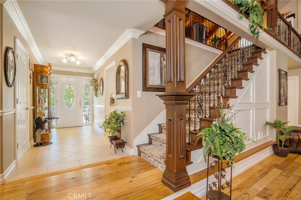 27767 Sand Canyon Road Canyon Country, CA 91387 - Photo 23 of 63 a view of entryway with wooden floor and a potted plant