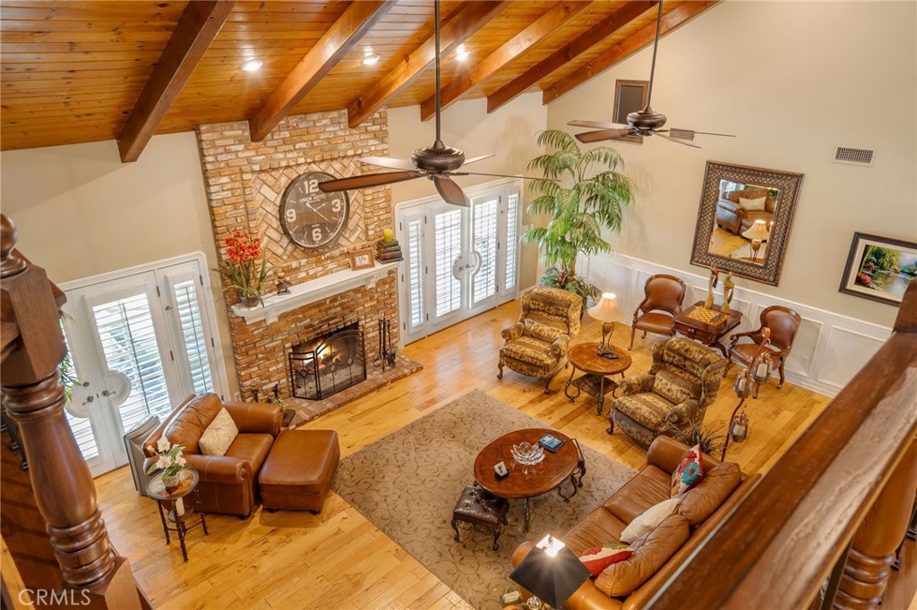 27767 Sand Canyon Road Canyon Country, CA 91387 - Photo 25 of 64 a view of a livingroom with furniture and a floor to ceiling window