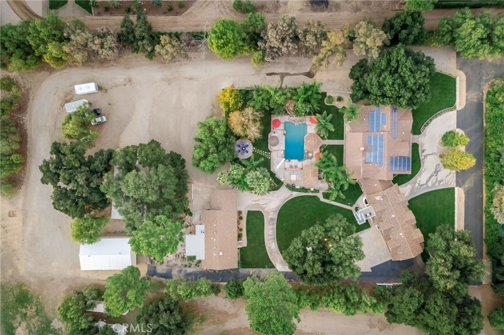 27767 Sand Canyon Road Canyon Country, CA 91387 - Photo 3 of 63 an aerial view of a house with a yard and lake view