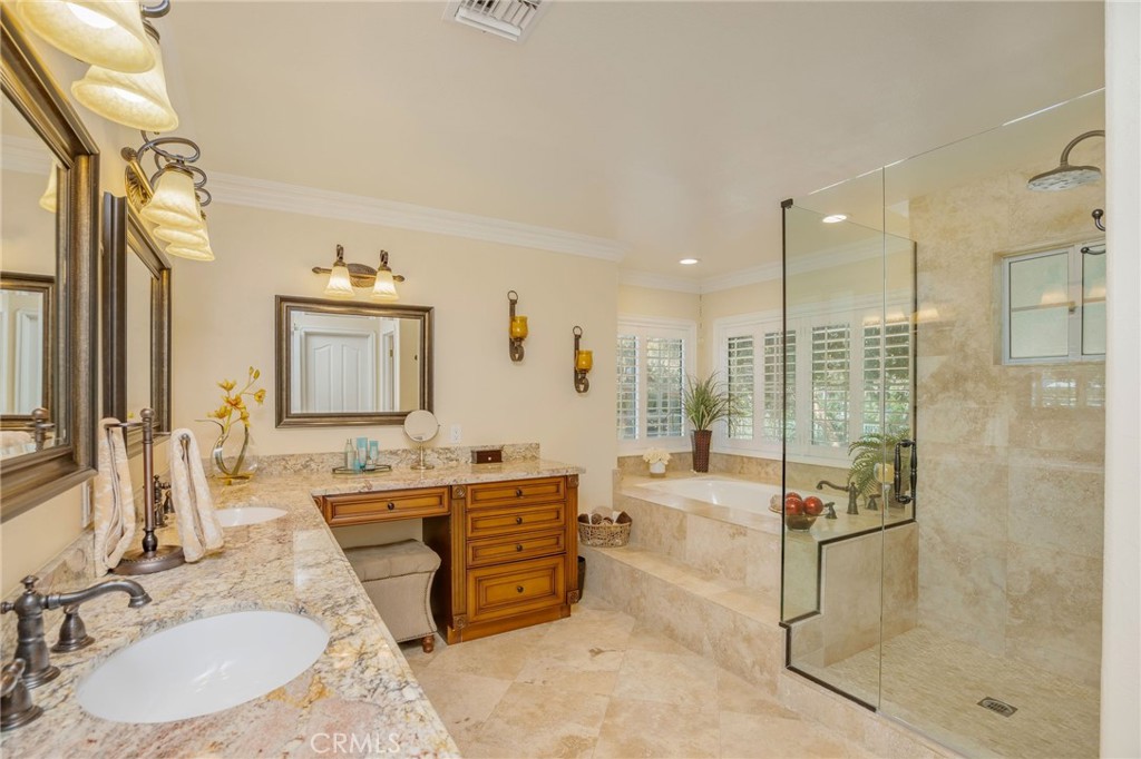 27767 Sand Canyon Road Canyon Country, CA 91387 - Photo 35 of 63 a bathroom with a tub sink and mirror