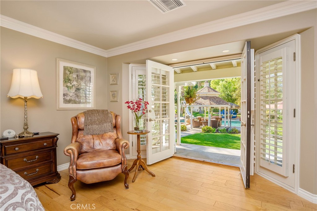 27767 Sand Canyon Road Canyon Country, CA 91387 - Photo 35 of 64 a living room with furniture and a floor to ceiling window