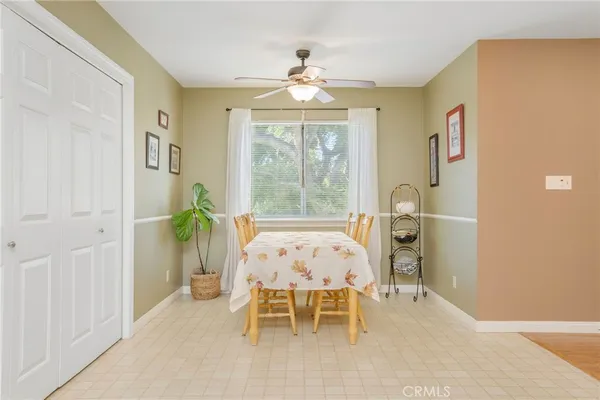 a large kitchen with stainless steel appliances lots of counter space sink and a dishwasher