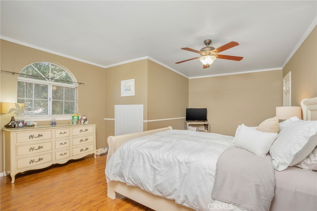 27767 Sand Canyon Road Canyon Country, CA 91387 - Photo 48 of 63 a bedroom with a bed and a dresser