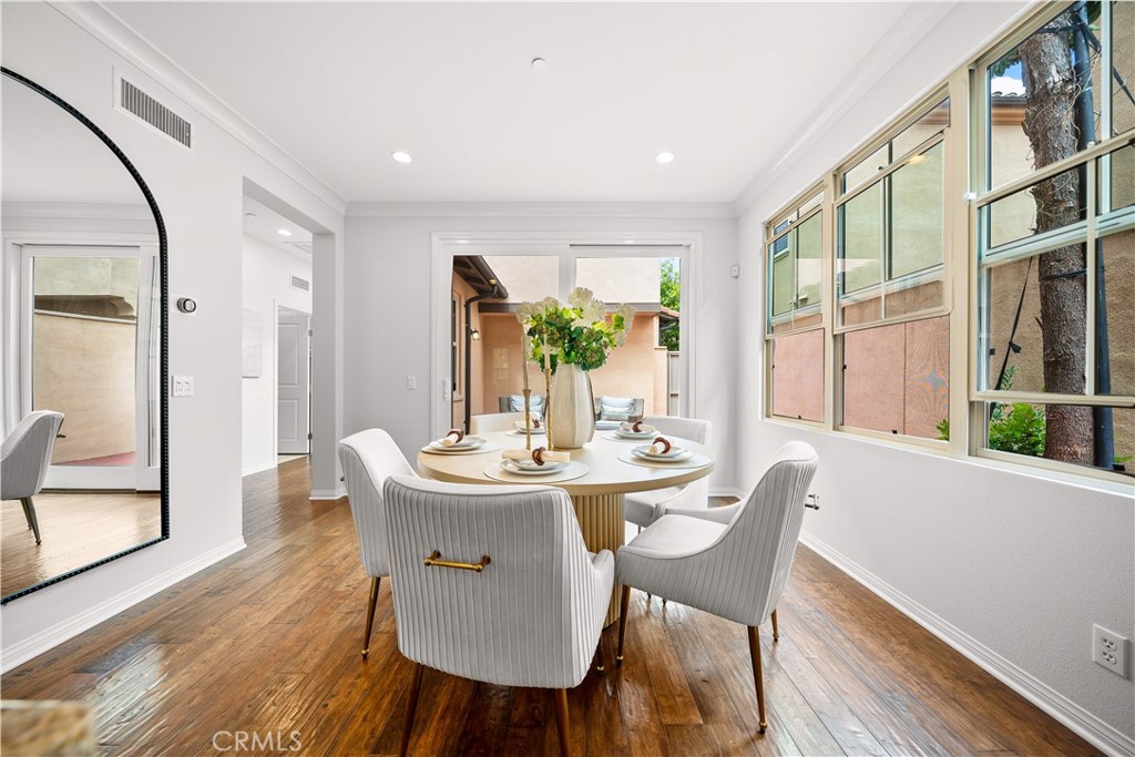 33 Jonquil Irvine, CA 92618 - Photo 15 of 48 a view of a dining room with furniture window and wooden floor