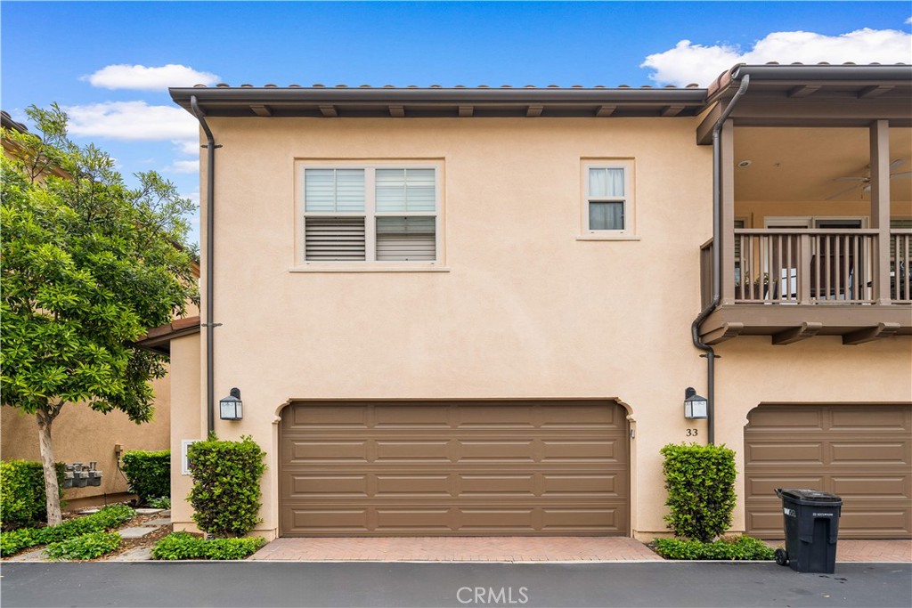 33 Jonquil Irvine, CA 92618 - Photo 36 of 48 a front view of a house with garage