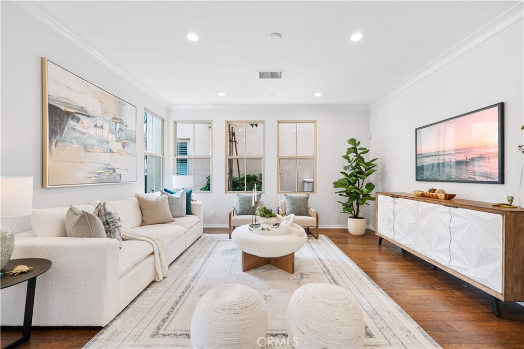 33 Jonquil Irvine, CA 92618 - Photo 7 of 48 a living room with furniture and a flat screen tv