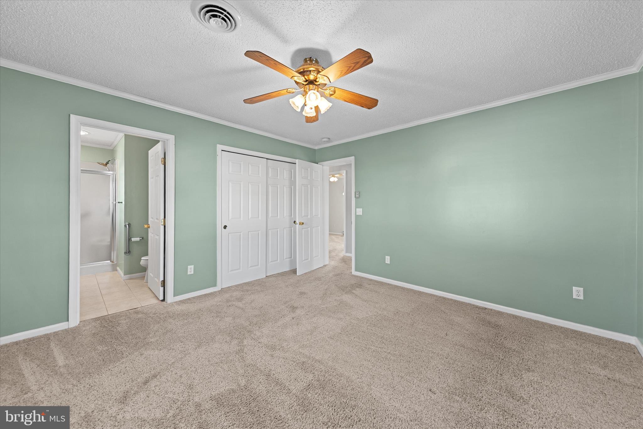 13 South Primrose Lane Ocean View, DE 19970 - Photo 24 of 38 an empty room with window and ceiling fan