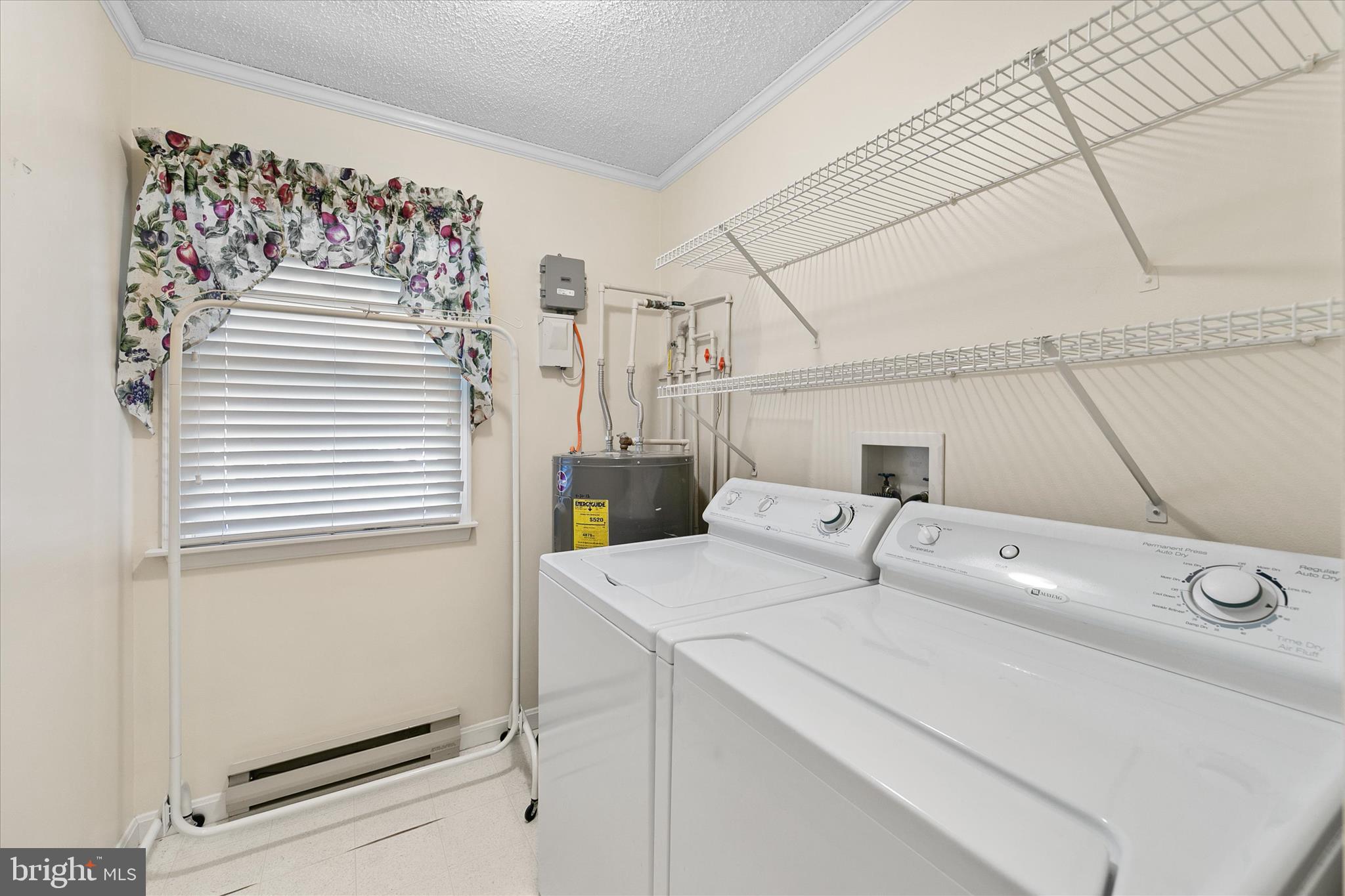 13 South Primrose Lane Ocean View, DE 19970 - Photo 27 of 38 a utility room with dryer and washer