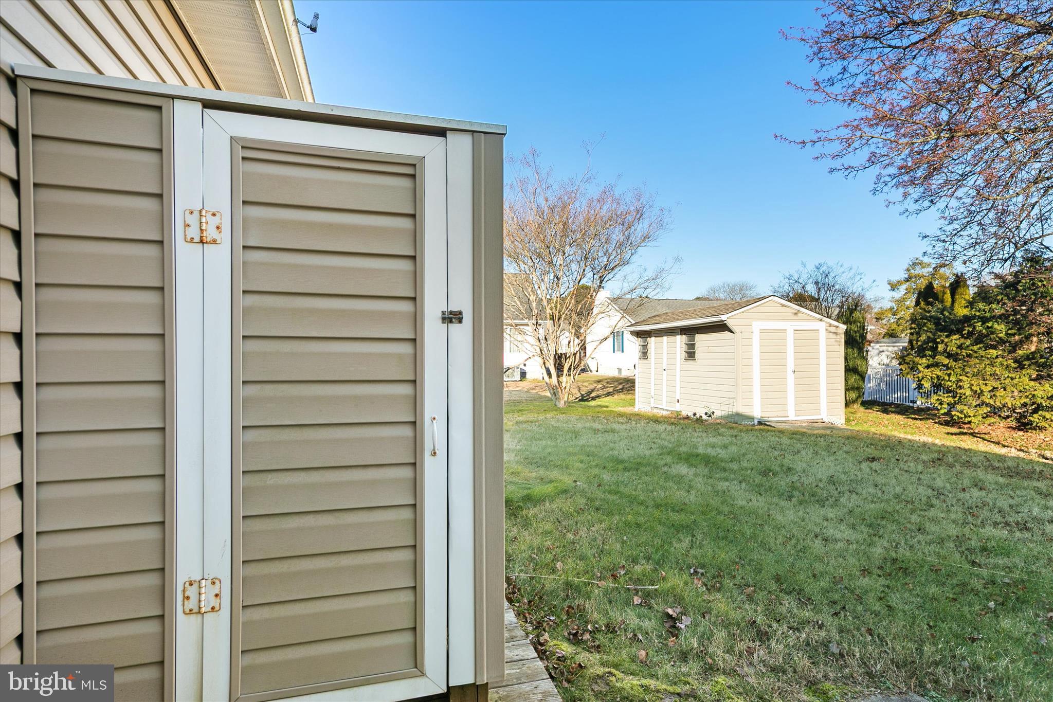 13 South Primrose Lane Ocean View, DE 19970 - Photo 30 of 38 a view of a house with backyard and garden