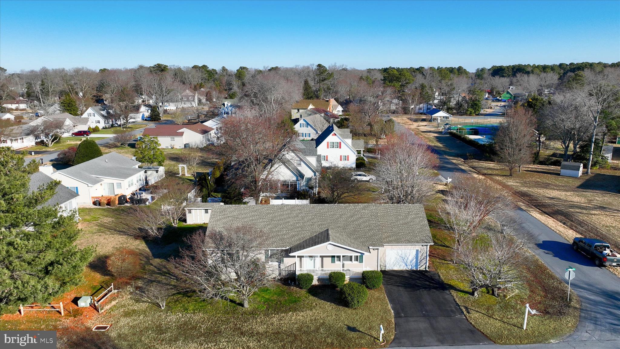 13 South Primrose Lane Ocean View, DE 19970 - Photo 34 of 38 an aerial view of multiple houses with outdoor space