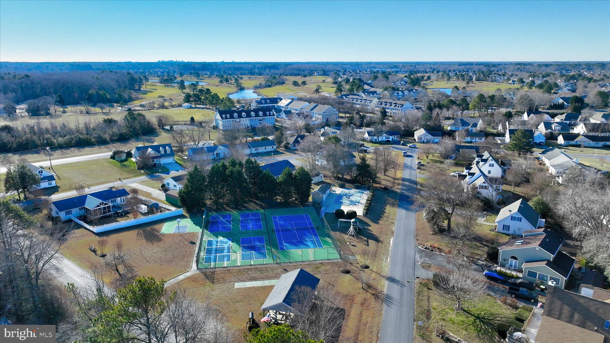 13 South Primrose Lane Ocean View, DE 19970 - Photo 37 of 38 an aerial view of a house with a garden and lake view