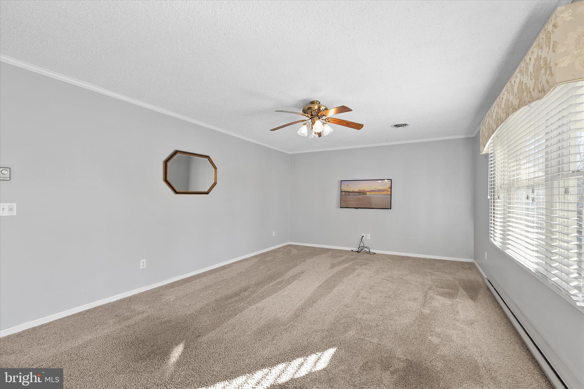 13 South Primrose Lane Ocean View, DE 19970 - Photo 7 of 38 an empty room with windows