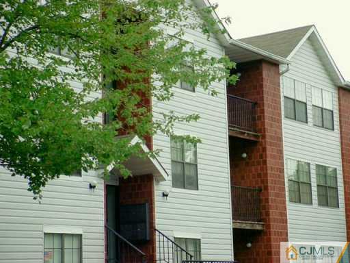92 Keystone Court Edison, NJ 08817 - Photo 2 of 2 a view of a house with a tree