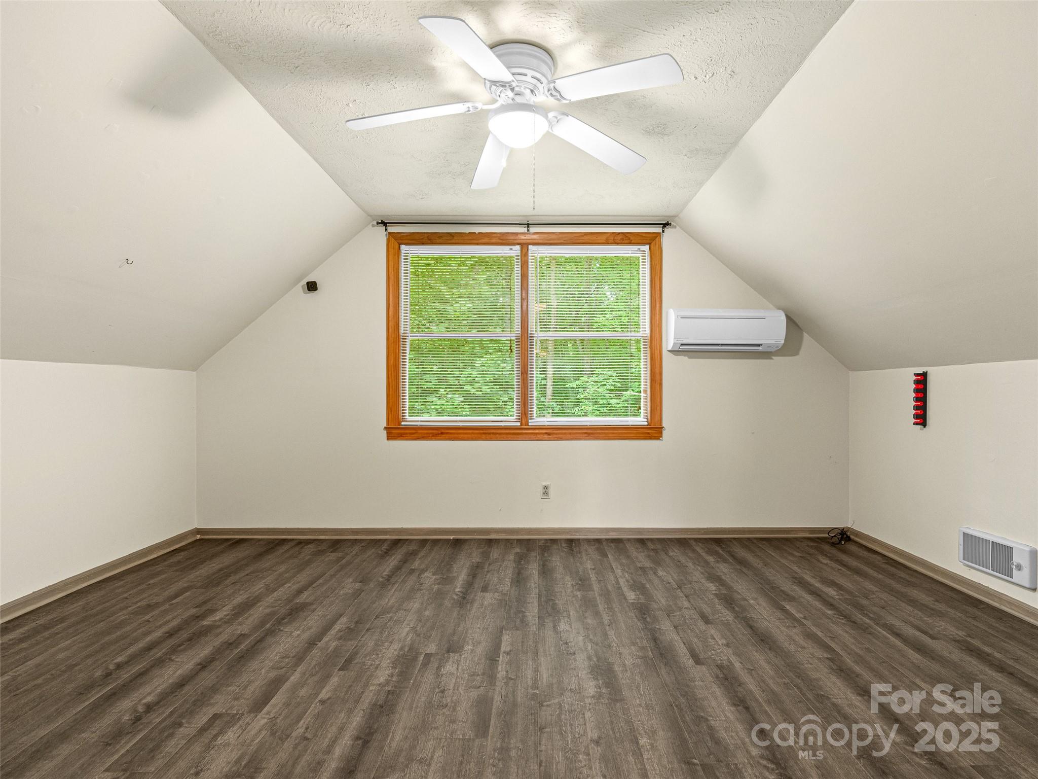 120 Wolf Pen Cove Road Brevard, NC 28712 - Photo 24 of 32 wooden floor in an empty room with a window