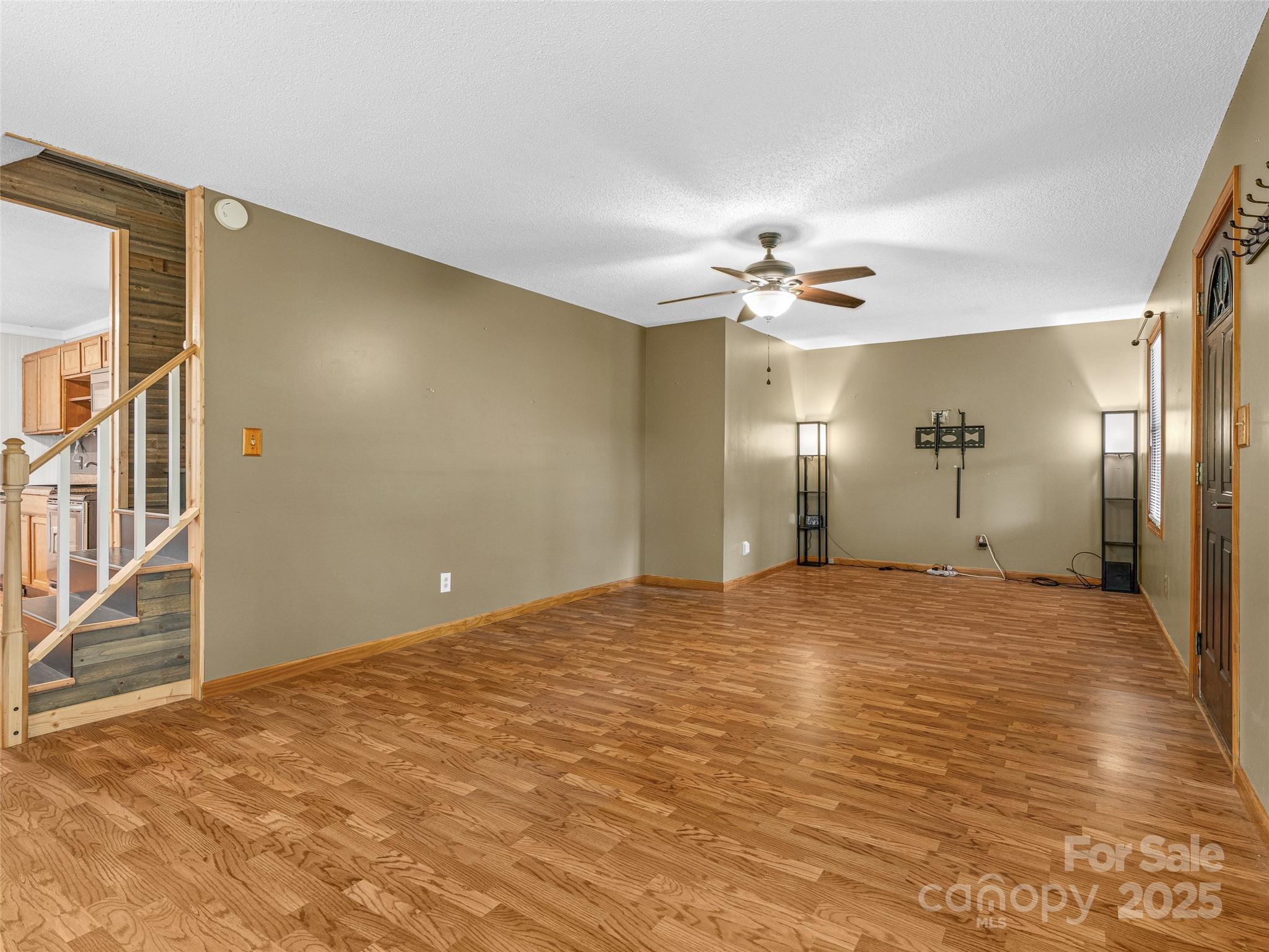 120 Wolf Pen Cove Road Brevard, NC 28712 - Photo 10 of 32 a view of empty room with a ceiling fan