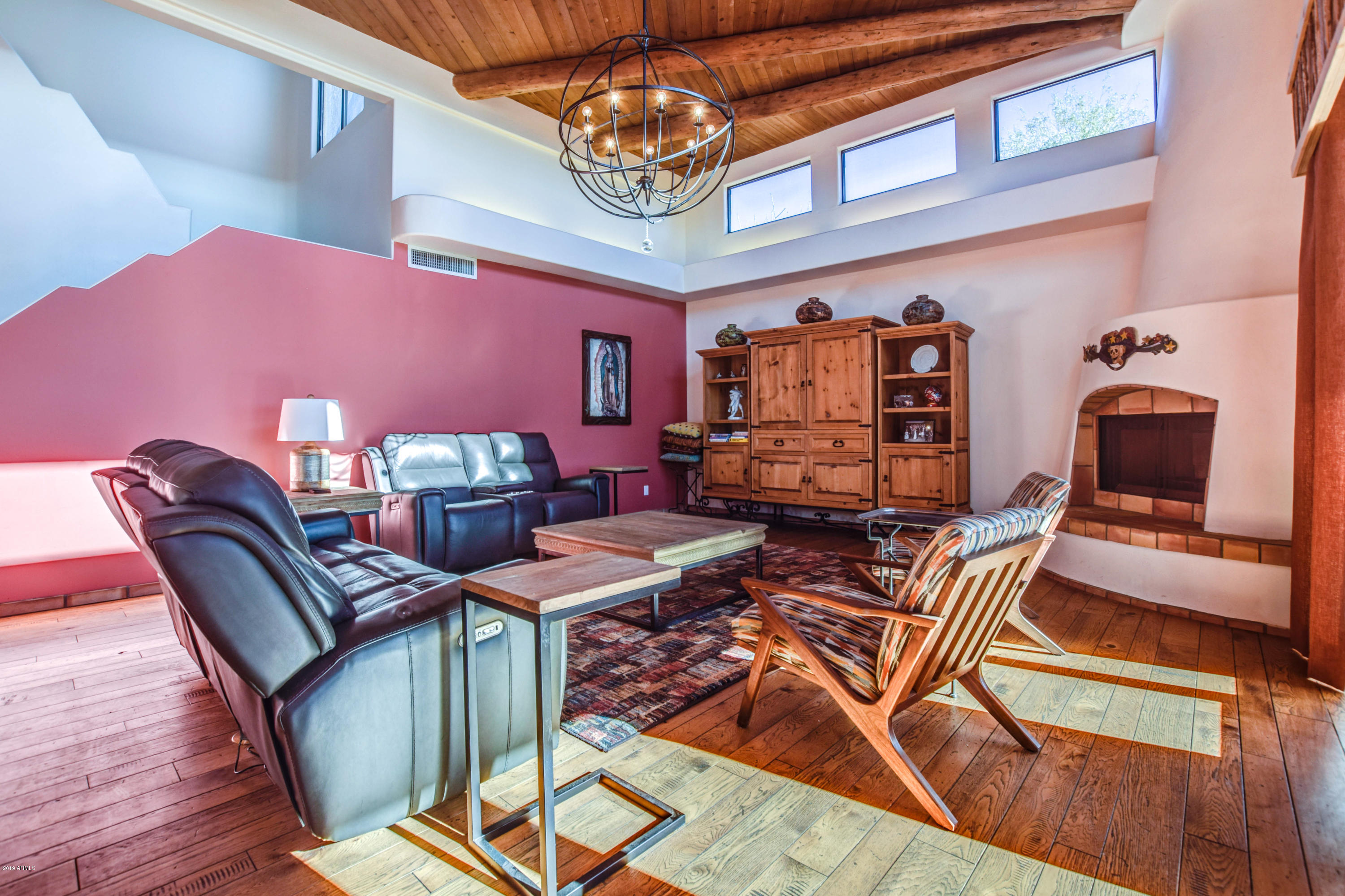 3530 North Hawes Road, Unit 10 Mesa, AZ 85207 - Photo 11 of 76 a view of a livingroom with furniture and a chandelier