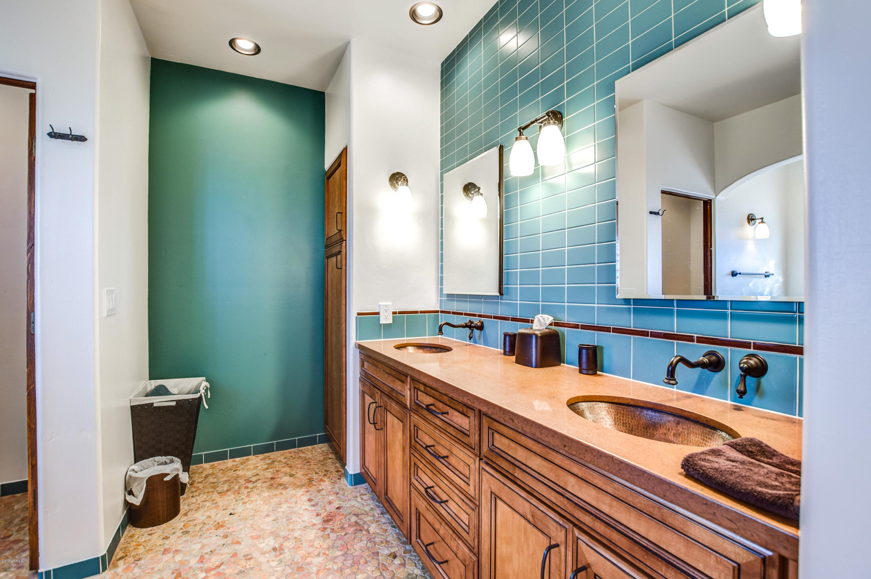 3530 North Hawes Road, Unit 10 Mesa, AZ 85207 - Photo 22 of 76 a bathroom with a double vanity sink and a mirror