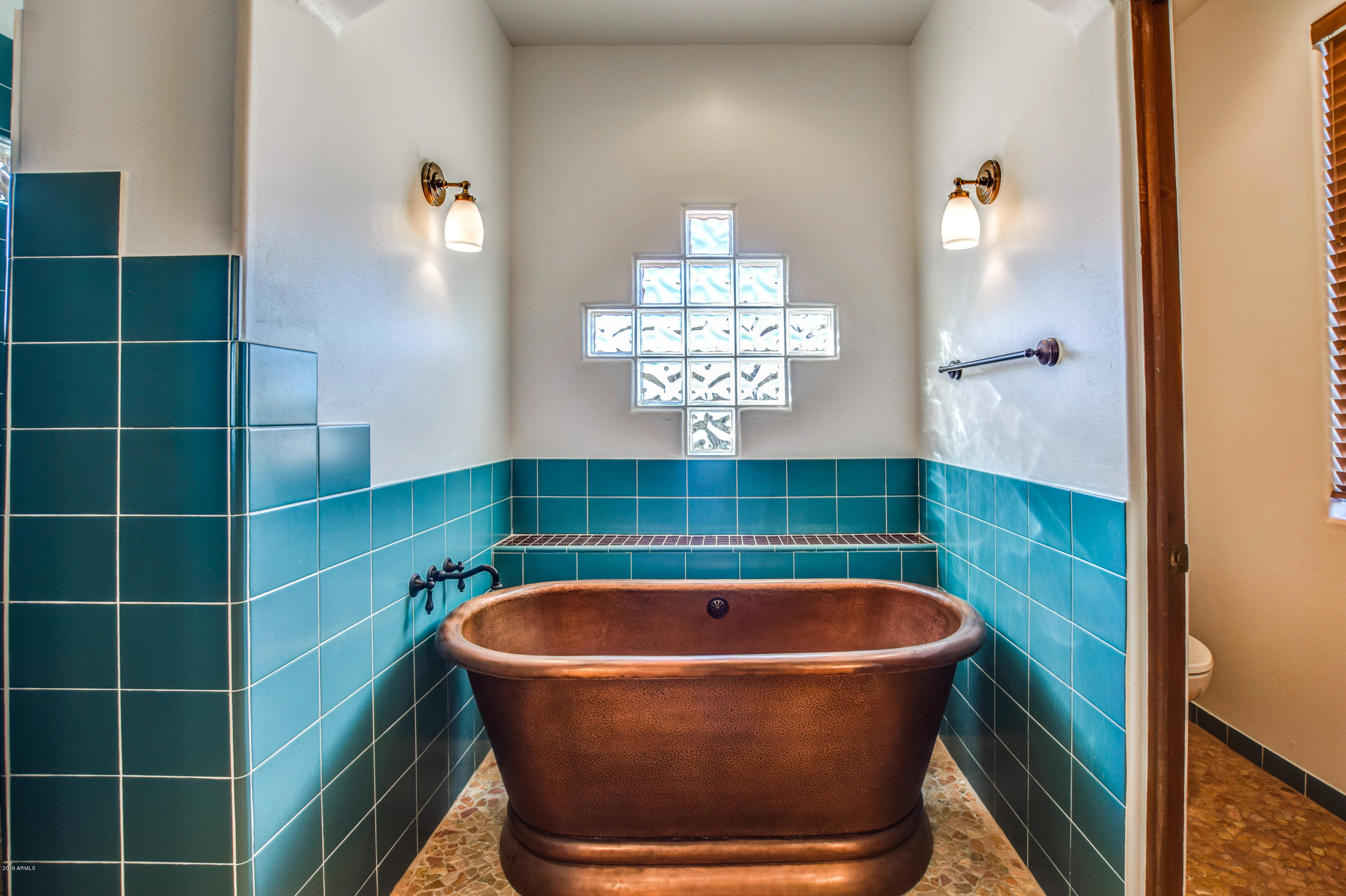 3530 North Hawes Road, Unit 10 Mesa, AZ 85207 - Photo 24 of 76 a bathroom with a bathtub