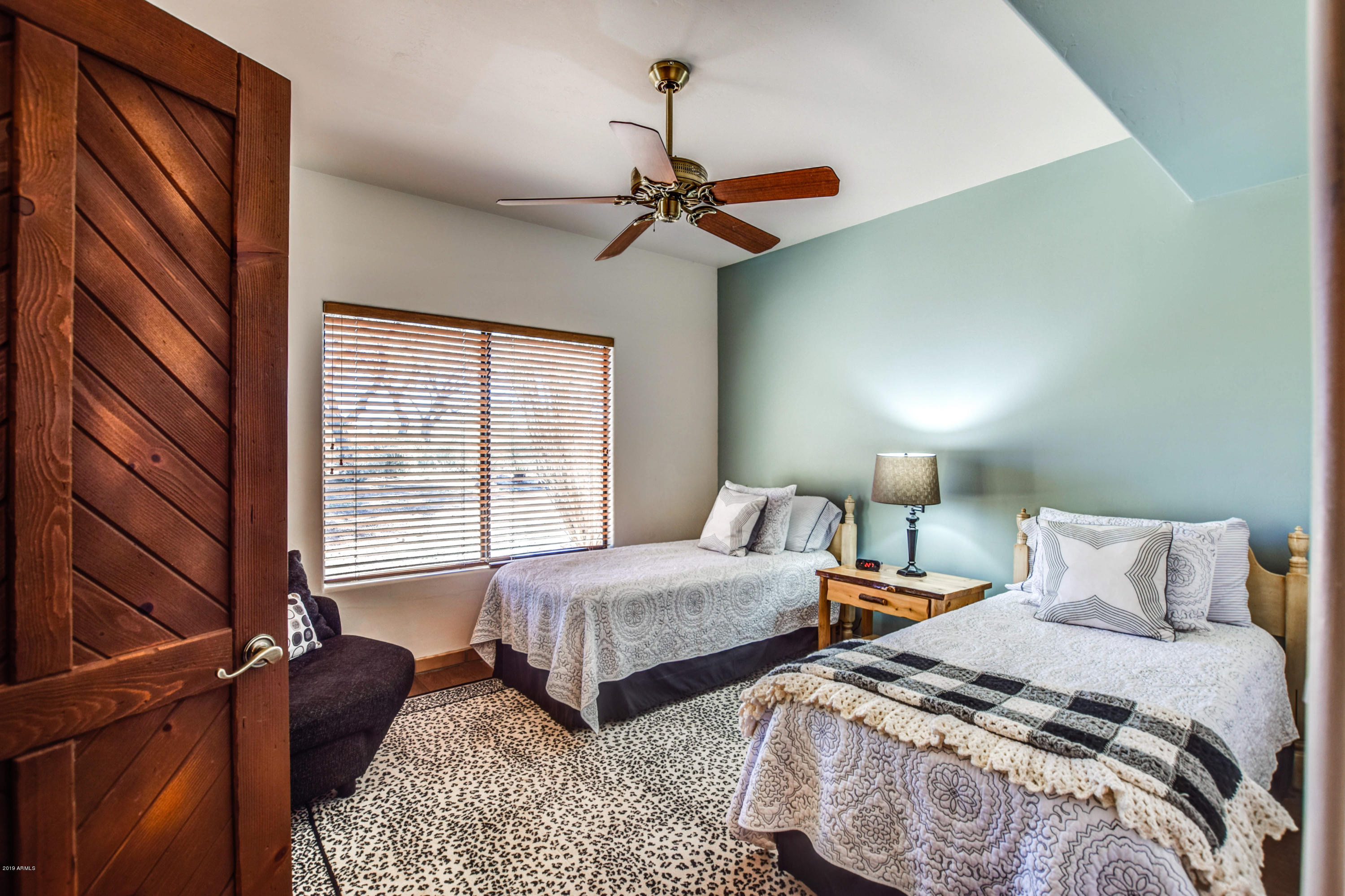 3530 North Hawes Road, Unit 10 Mesa, AZ 85207 - Photo 26 of 76 a bedroom with two beds and large window