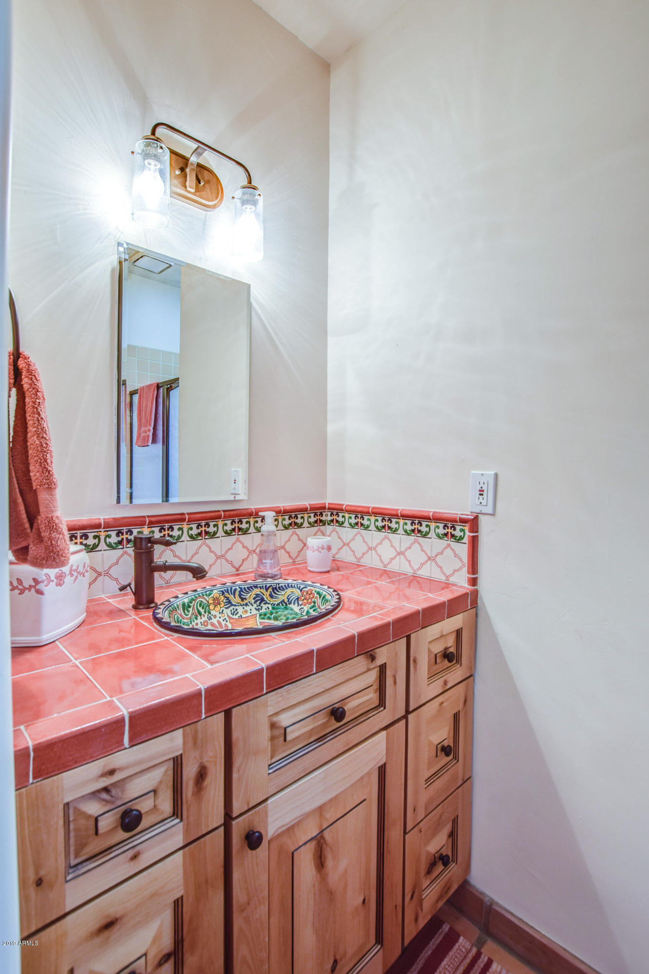 3530 North Hawes Road, Unit 10 Mesa, AZ 85207 - Photo 29 of 76 a bathroom with a sink and a mirror