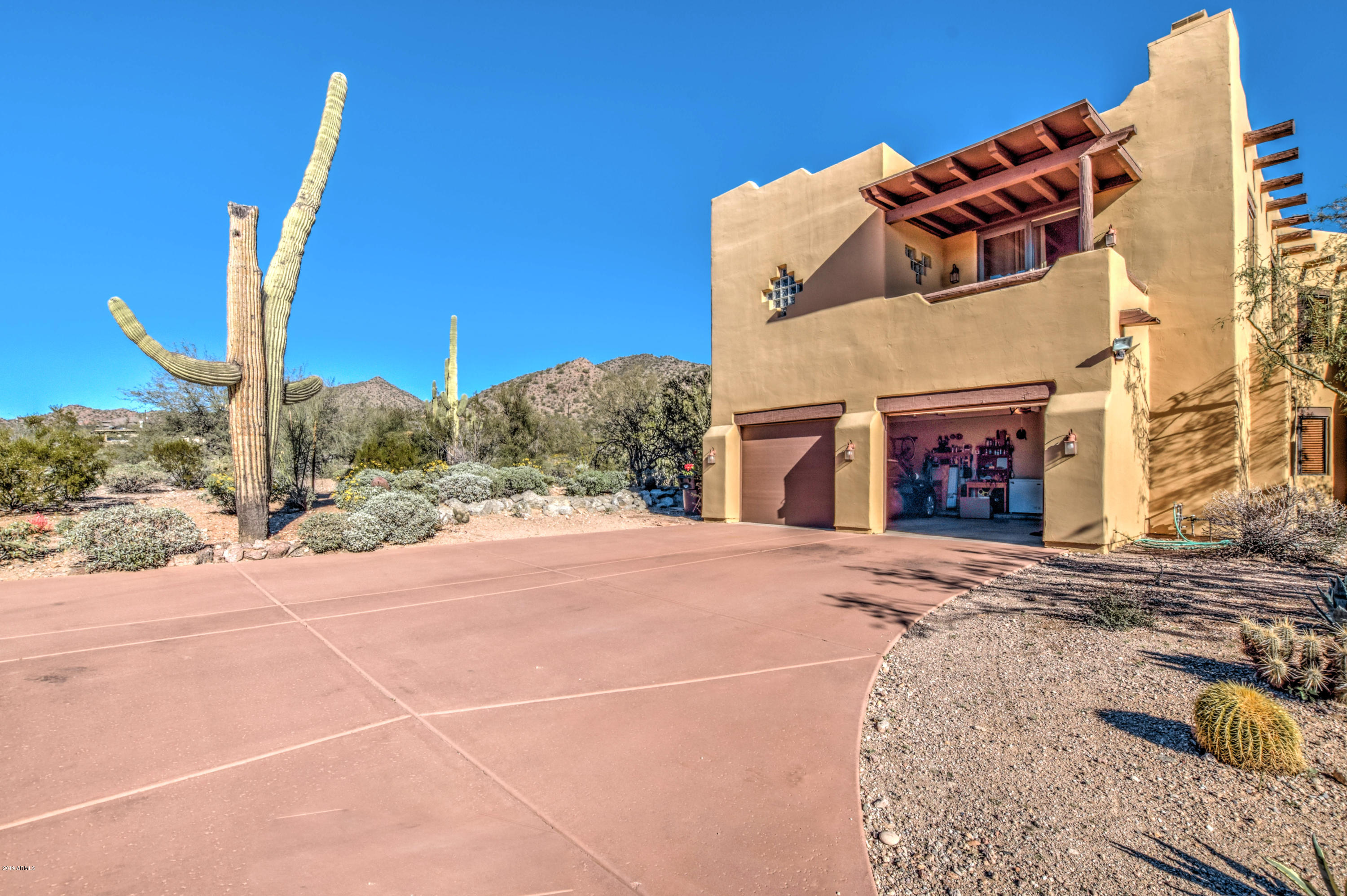3530 North Hawes Road, Unit 10 Mesa, AZ 85207 - Photo 50 of 76 a front view of a building with street