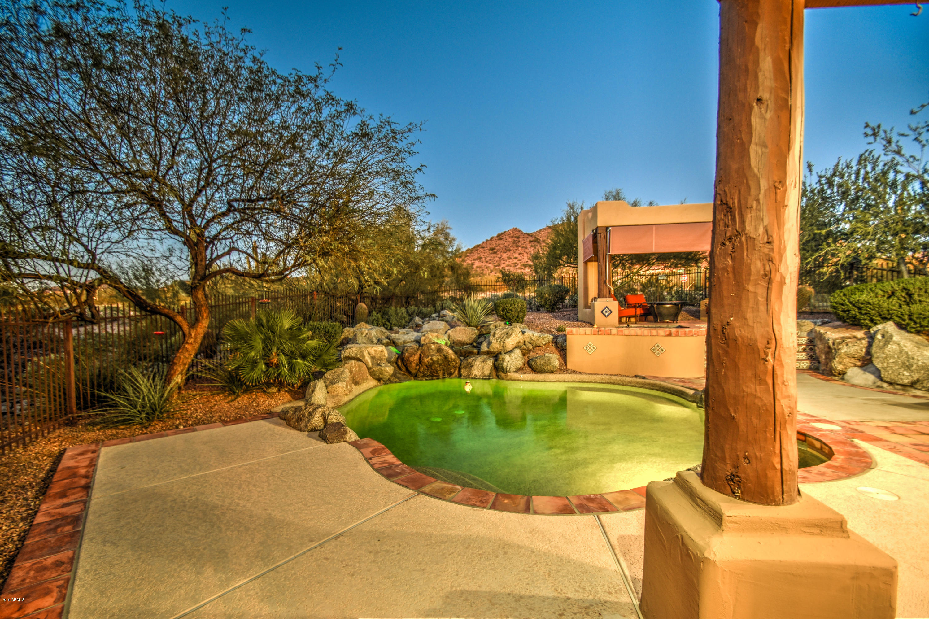 3530 North Hawes Road, Unit 10 Mesa, AZ 85207 - Photo 57 of 76 a view of a swimming pool with a yard