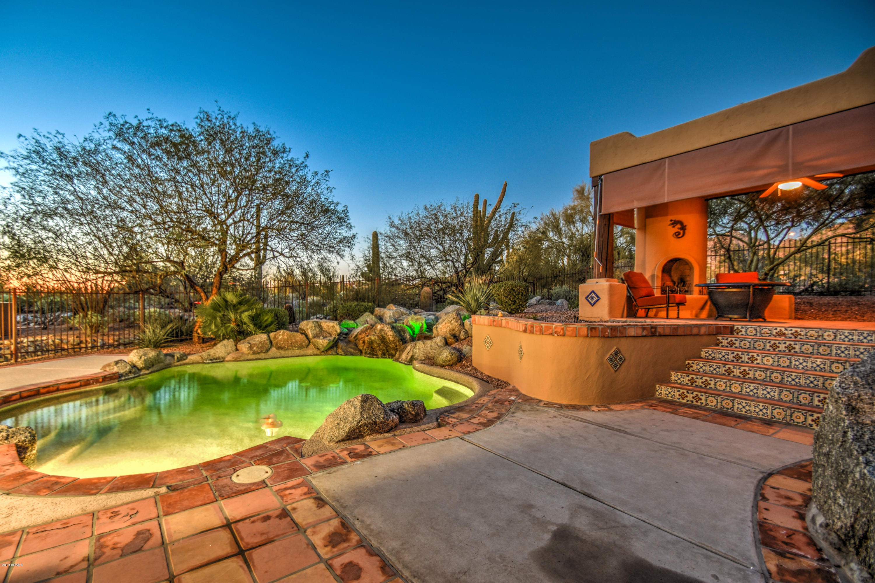 3530 North Hawes Road, Unit 10 Mesa, AZ 85207 - Photo 60 of 76 a view of a swimming pool with a patio