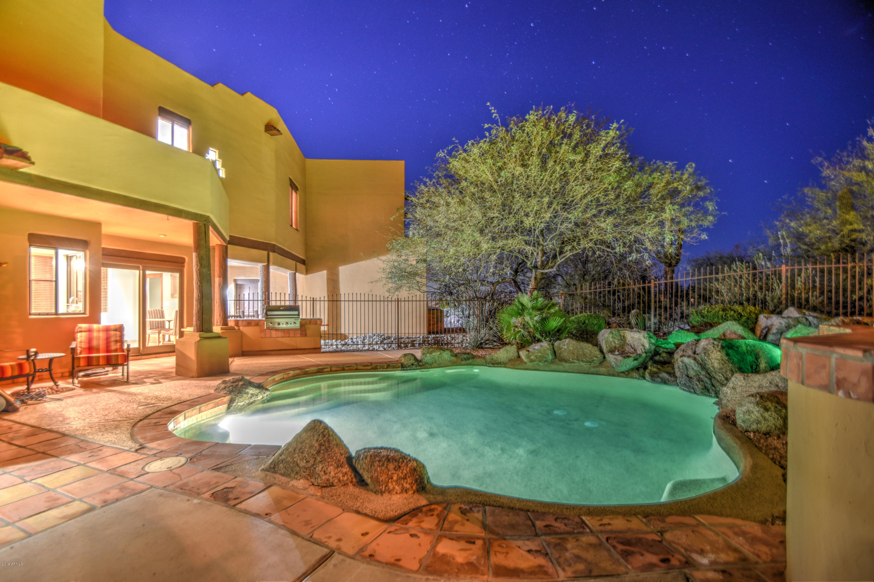 3530 North Hawes Road, Unit 10 Mesa, AZ 85207 - Photo 73 of 76 a swimming pool with outdoor seating and yard