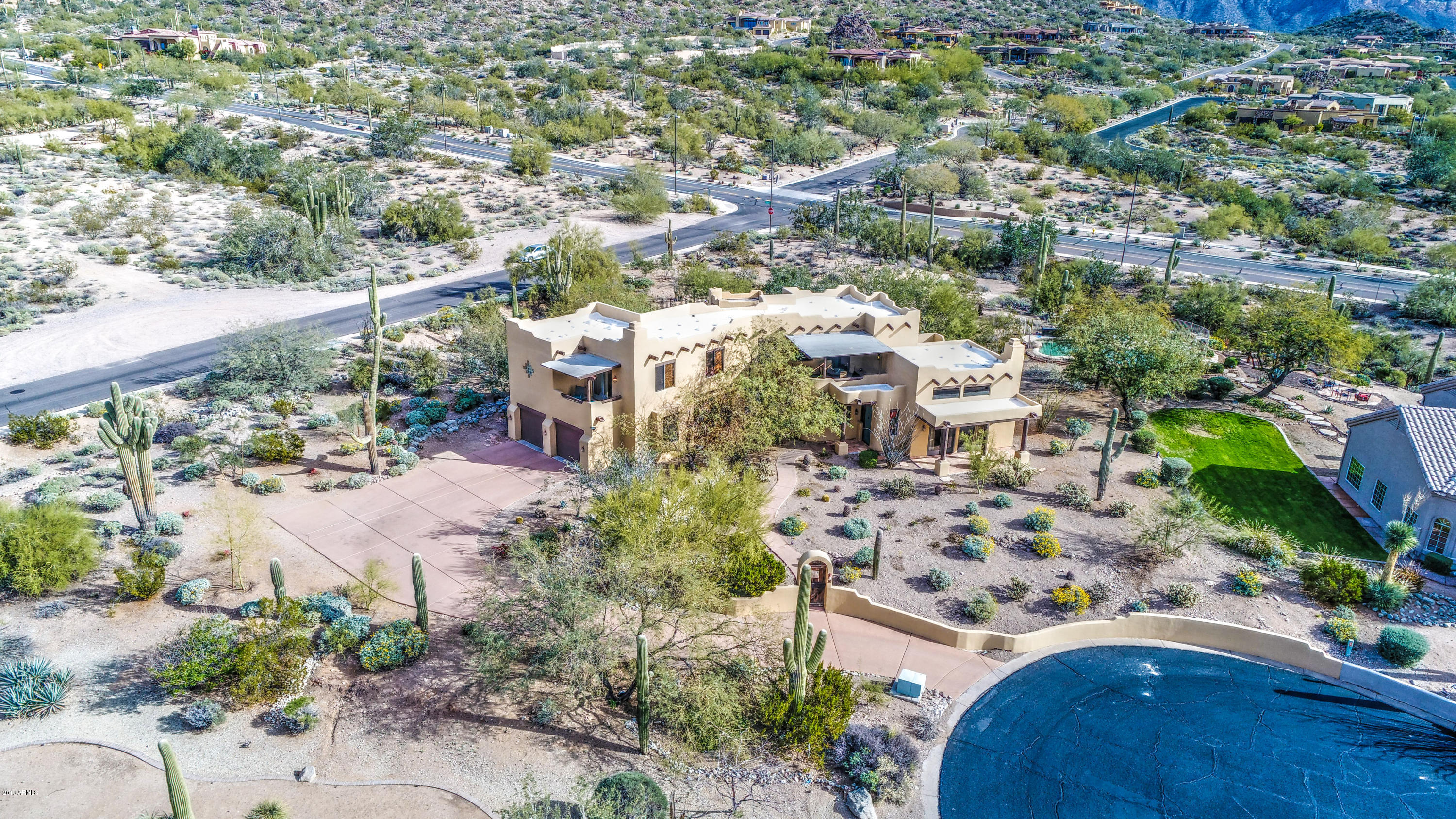 3530 North Hawes Road, Unit 10 Mesa, AZ 85207 - Photo 76 of 76 an aerial view of residential houses with outdoor space