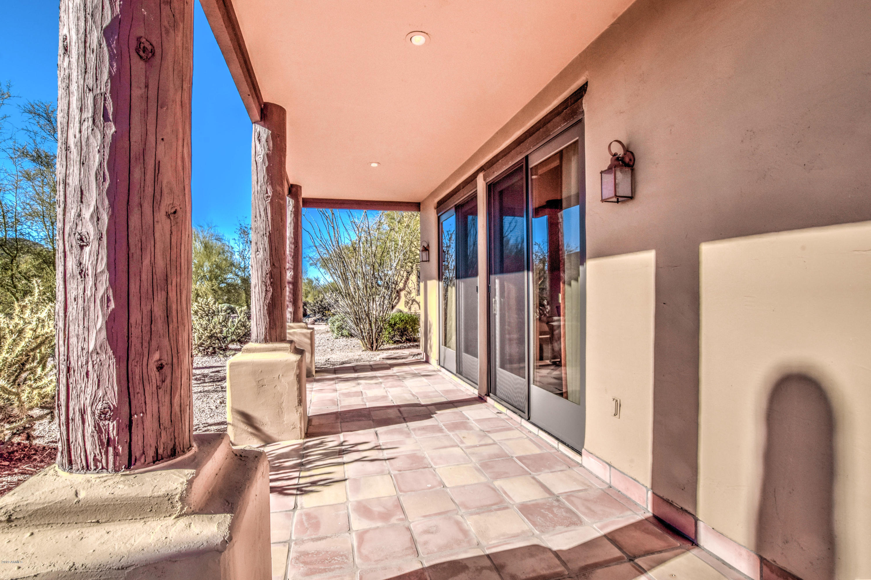 3530 North Hawes Road, Unit 10 Mesa, AZ 85207 - Photo 10 of 76 a very nice looking room with a large window and furniture