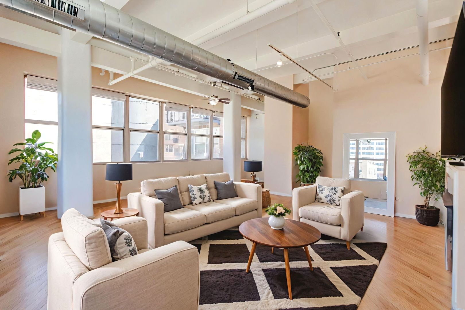 500 South Clinton Street, Unit 743 Chicago, IL 60607 - Photo 3 of 16 a living room with furniture and a large window