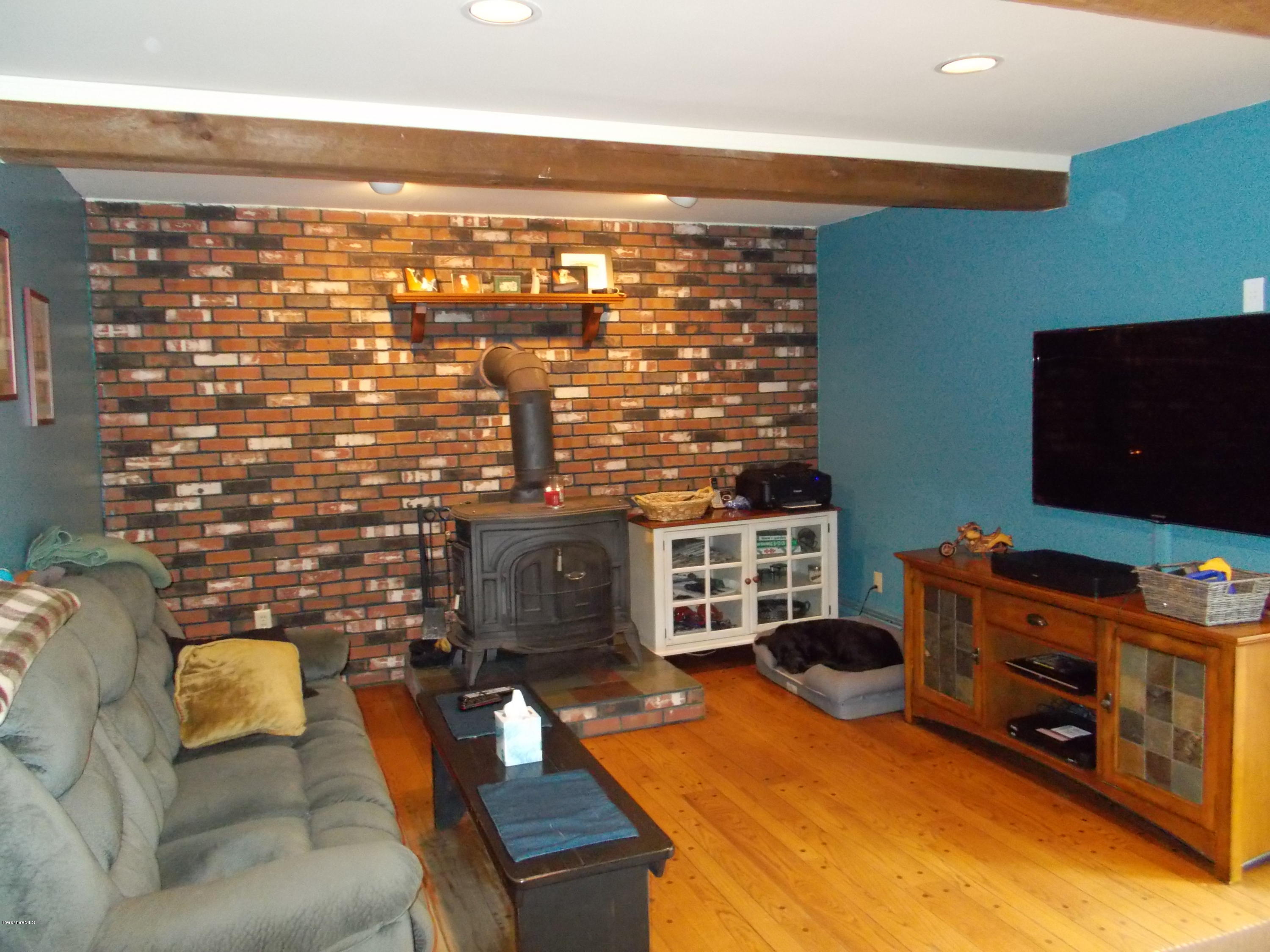 180 Johnson Road Dalton, MA 01226 - Photo 10 of 37 Den off from Kitchen