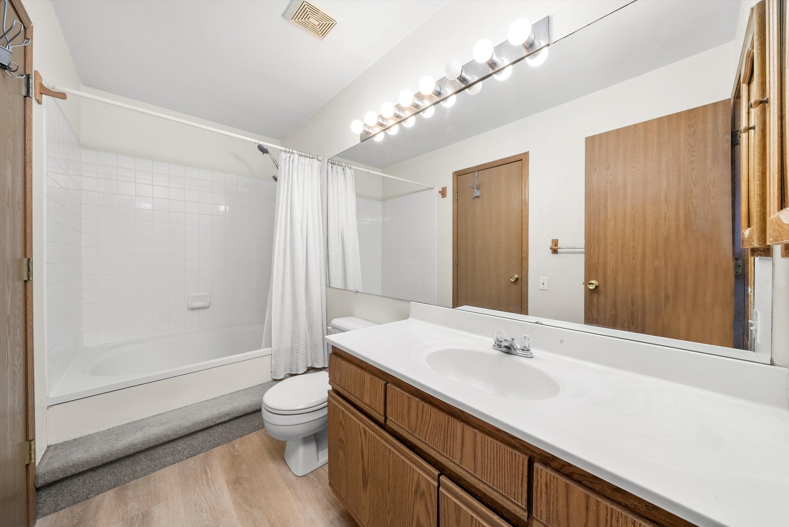 1862 Pebble Beach Circle Elgin, IL 60123 - Photo 15 of 26 a bathroom with a sink a toilet and shower