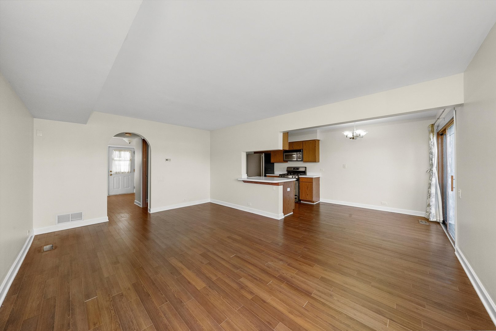 1862 Pebble Beach Circle Elgin, IL 60123 - Photo 6 of 26 a view of empty room with wooden floor