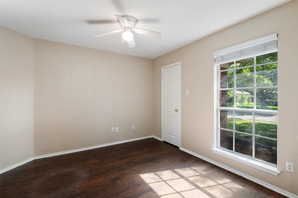 1008 Chippewa Round Rock, TX 78665 - Photo 27 of 36 a view of empty room with wooden floor and fan