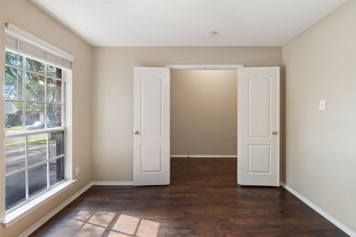 1008 Chippewa Round Rock, TX 78665 - Photo 28 of 36 an empty room with wooden floor and windows
