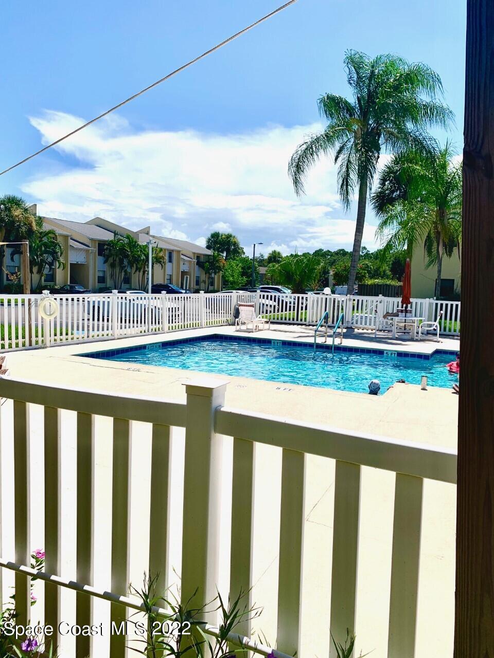 584 North Wickham Road, Unit 82 Melbourne, FL 32935 - Photo 23 of 43 a view of a lake with a mountain view