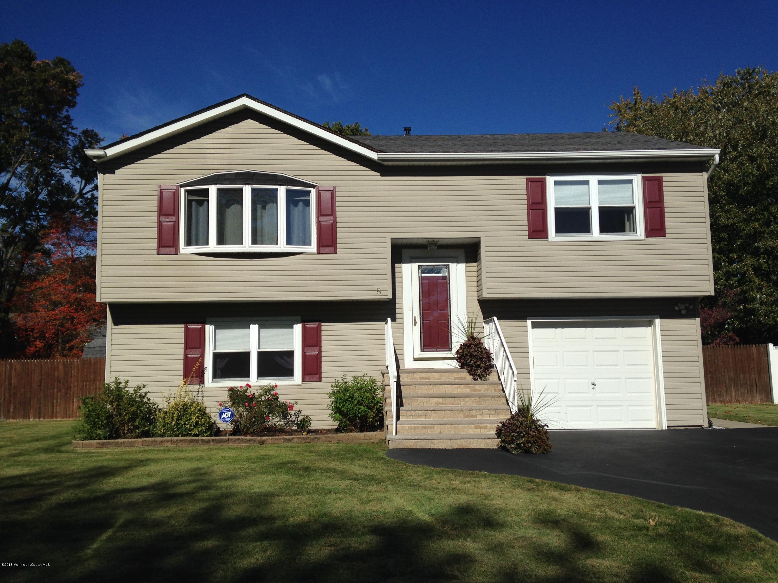 8 Bunkerhill Road Hazlet, NJ 07730 - Photo 1 of 22 a front view of a house with a yard