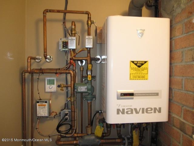 8 Bunkerhill Road Hazlet, NJ 07730 - Photo 16 of 22 a view of a bathroom with gym equipment
