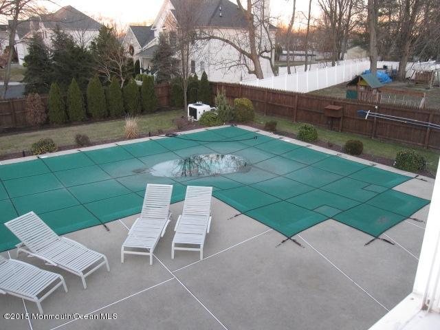 8 Bunkerhill Road Hazlet, NJ 07730 - Photo 18 of 22 a view of backyard with outdoor seating