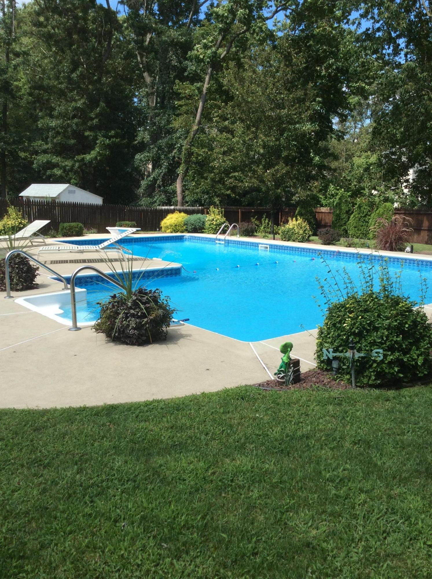 8 Bunkerhill Road Hazlet, NJ 07730 - Photo 21 of 22 a view of a house with a yard