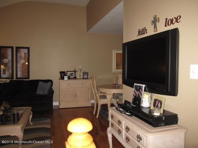 8 Bunkerhill Road Hazlet, NJ 07730 - Photo 3 of 22 a kitchen with a stove and a flat screen tv