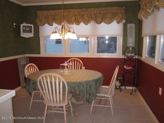 8 Bunkerhill Road Hazlet, NJ 07730 - Photo 7 of 22 a view of a dining room with furniture
