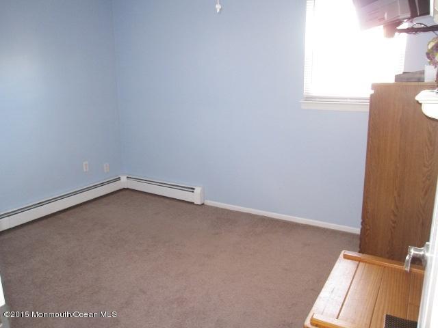 8 Bunkerhill Road Hazlet, NJ 07730 - Photo 9 of 22 a room with a window