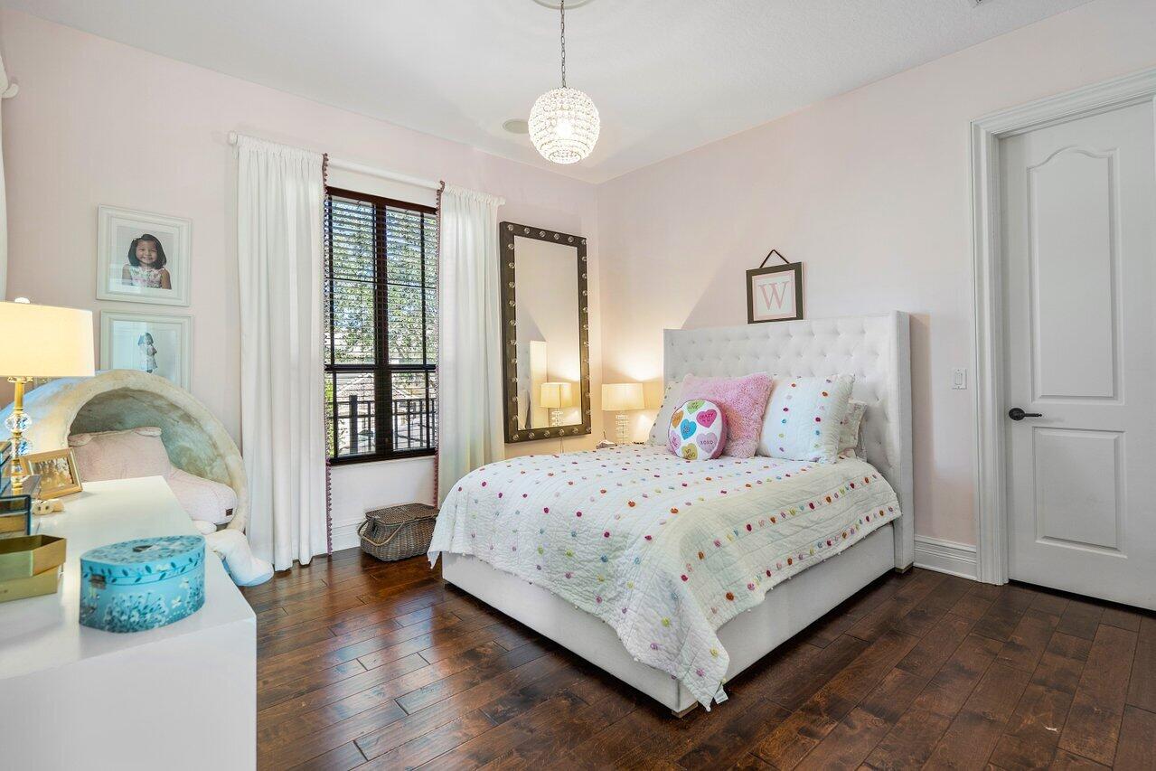 9891 Equus Circle Boynton Beach, FL 33472 - Photo 34 of 88 a bedroom with a bed and window